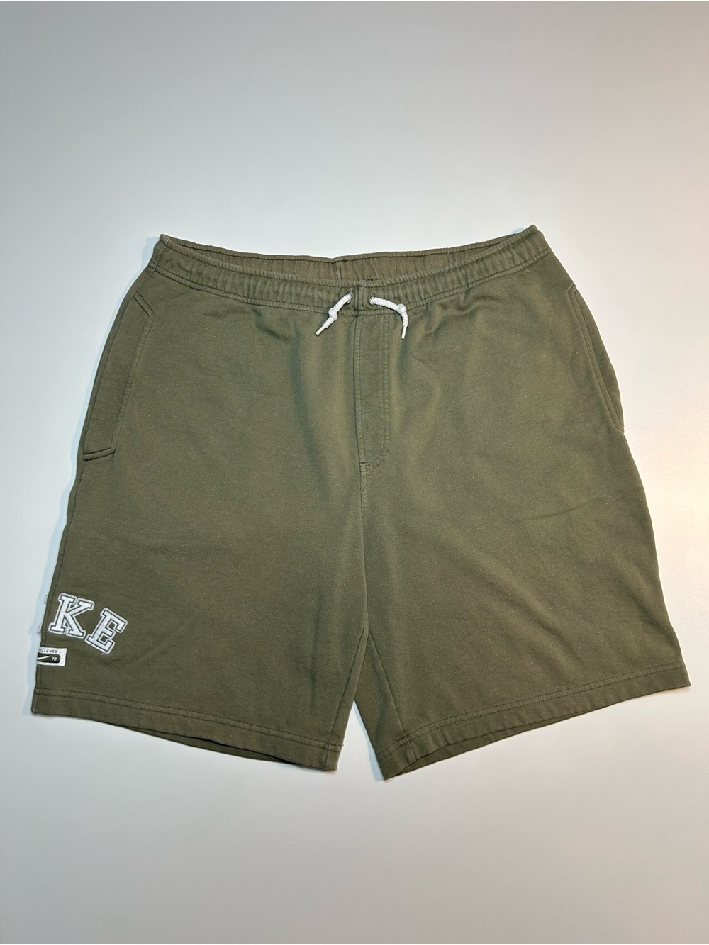 Nike Sportswear Club Fleece Varsity Block Letter Graphic Shorts Olive